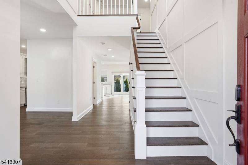 Perfect modern home with timeless curb appeal a charming white picket fence awaits in this exceptional custom Colonial, rebuilt from the foundation up in 2019 with high end finishes, sophisticated ...
