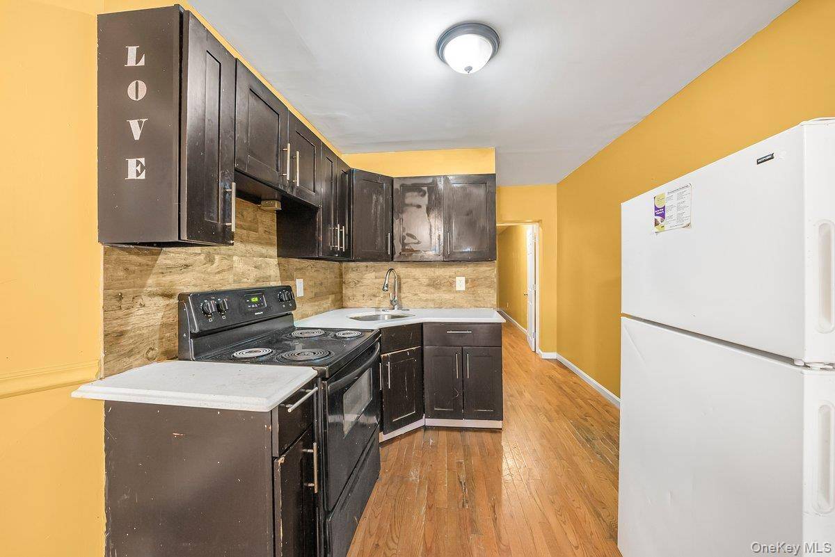 Welcome to 843 E 167th Street, a versatile two family home located in the Foxhurst section of the Bronx.
