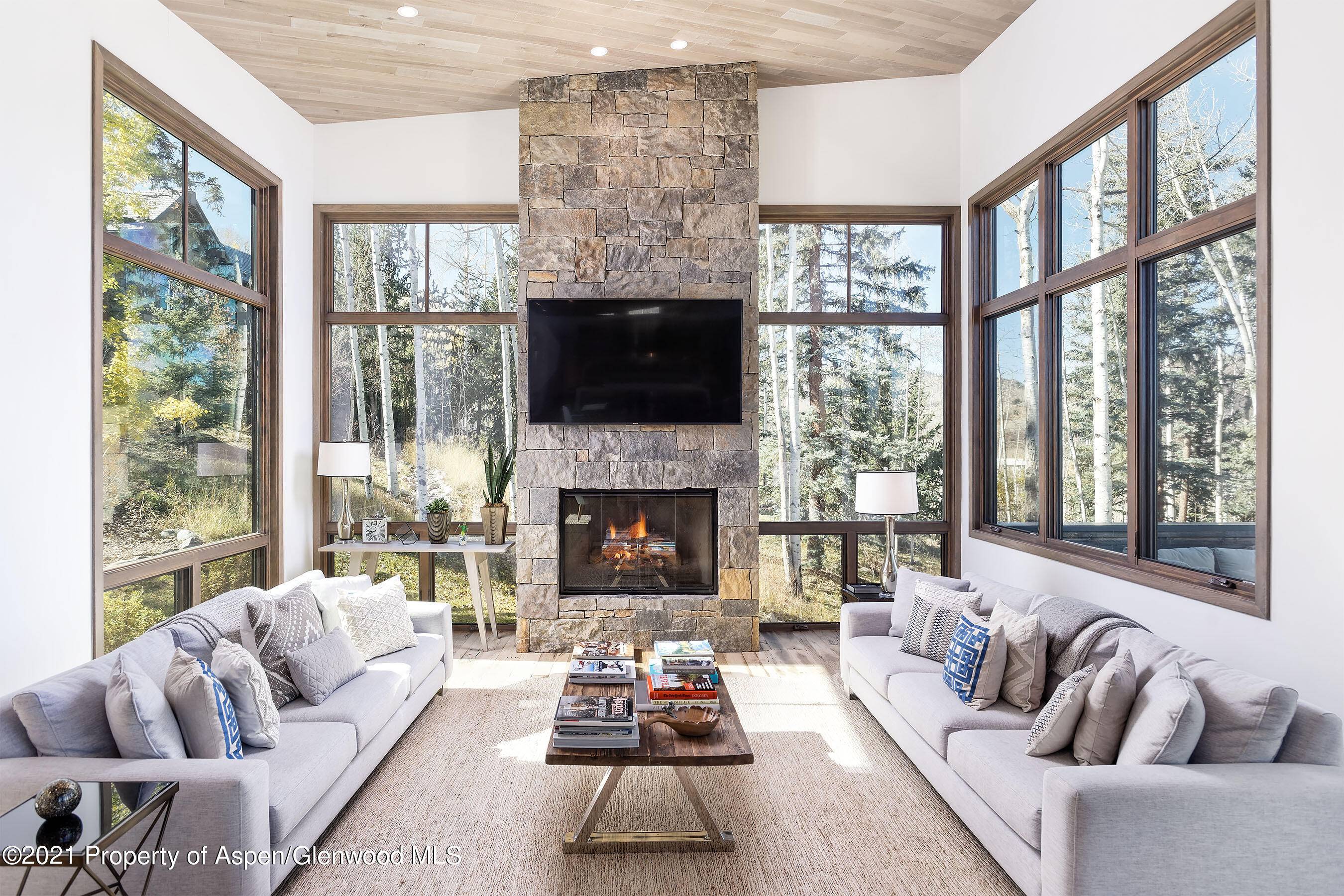 Indulge in the epitome of mountain modern luxury with this magnificent estate residence boasting exceptional ski in ski out access and panoramic mountain vistas.