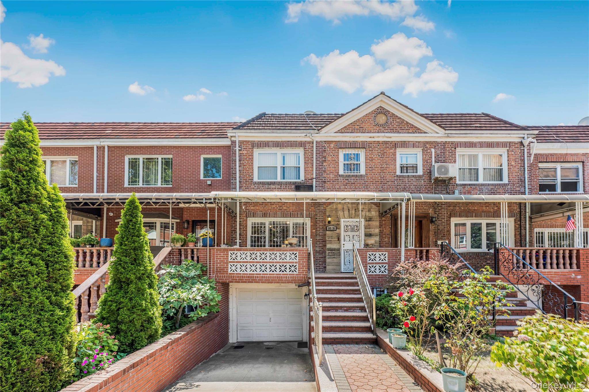 Beautiful recently renovated attached colonial extended home in the heart of Rego Park.