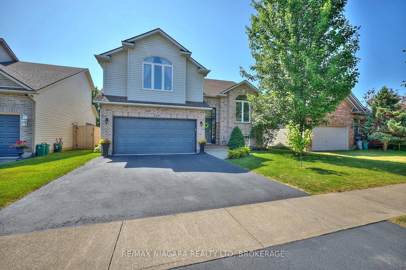 Welcome to 405 Jordyn Dr, a beautifully maintained 4 bedroom backsplit offering nearly 2, 000 sq.