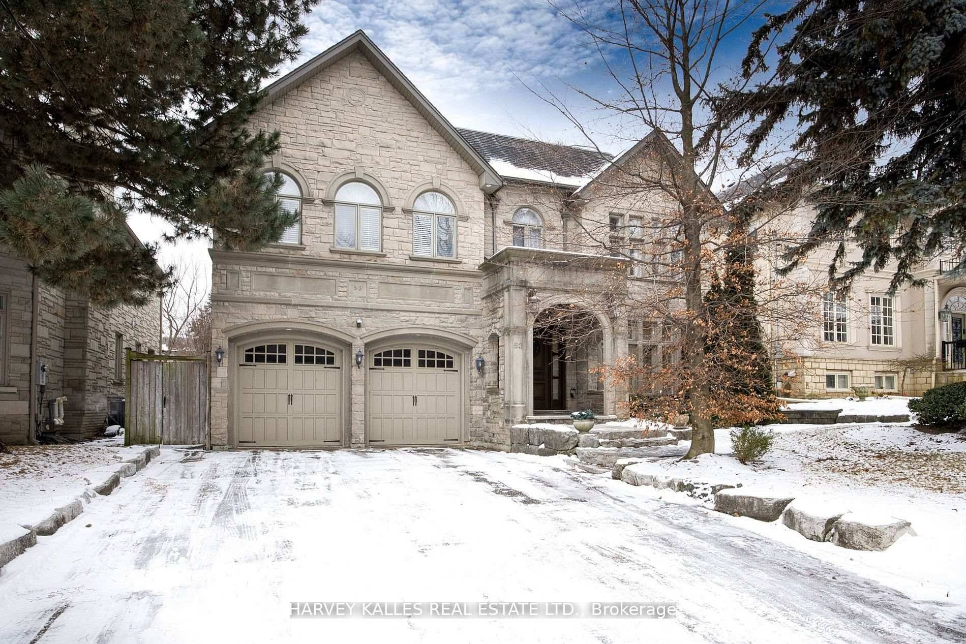 Stately Owen Sound stone and pre cast front elevation quickly draws you towards and into this beautiful residence.