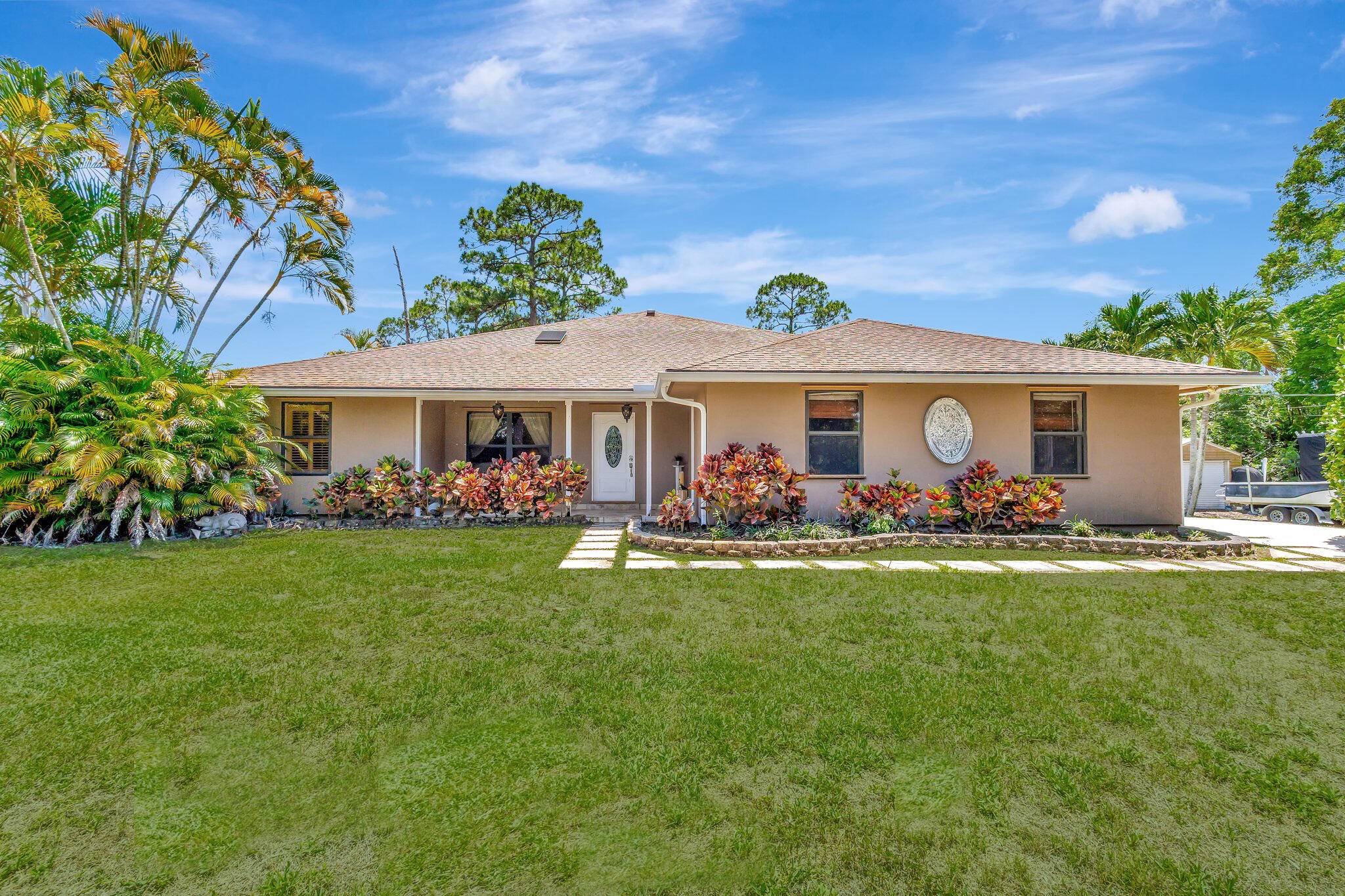 Enjoy the country life with this sprawling ranch on 1.