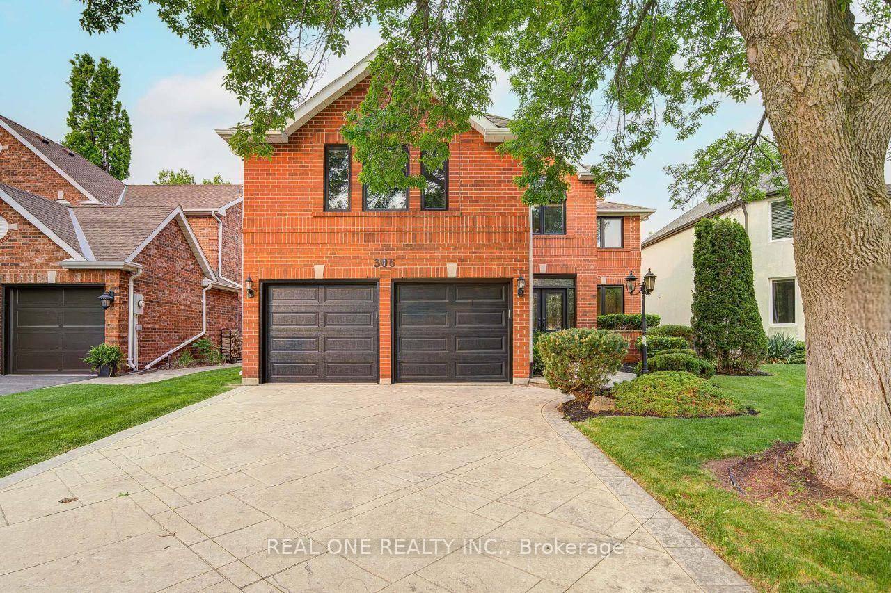 Ravine Lot ! Fully Renovated 4 bedroom private 2nd floor office, 5 bath home backing onto a scenic ravine trail in Prestigious Glen Abbey.
