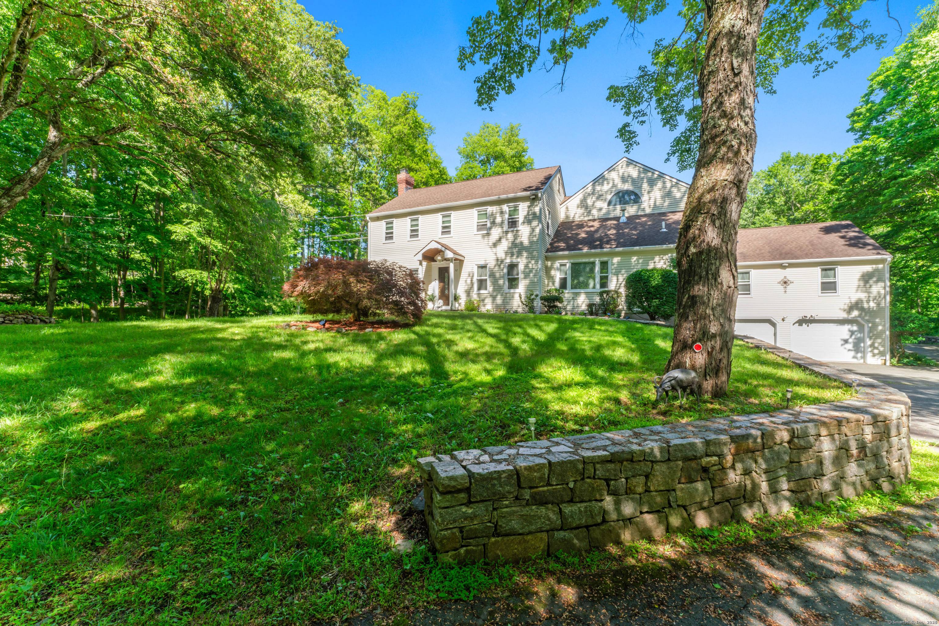Nestled on over 3. 5 private acres in the scenic hills of Newtown, 32 Echo Valley Road offers timeless Colonial charm and exceptional living space.
