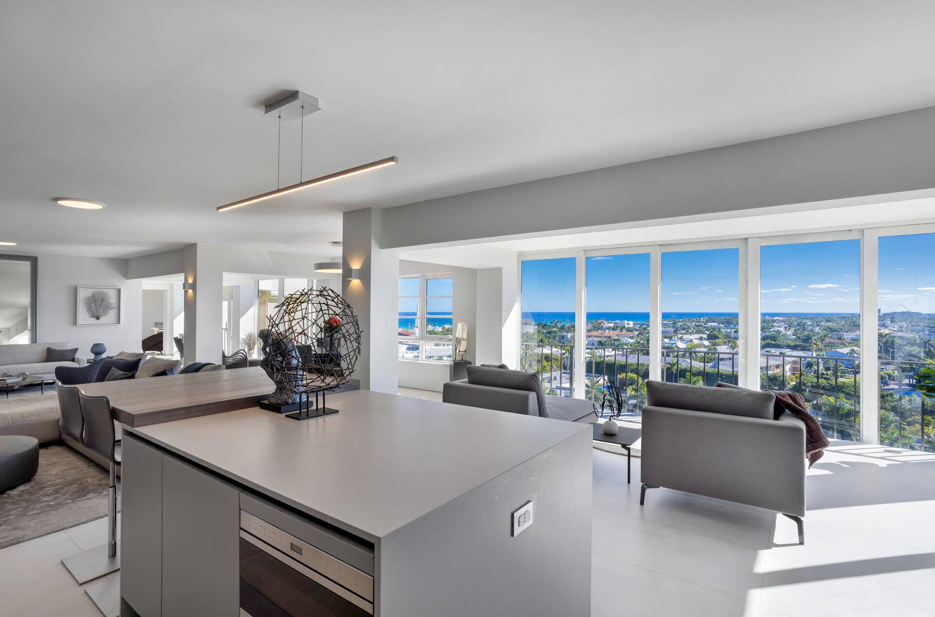 Two blocks from the ocean on vibrant Atlantic Avenue, Delray Beach, this totally renovated contemporary penthouse offers awe inspiring ocean, Intracoastal and city views.