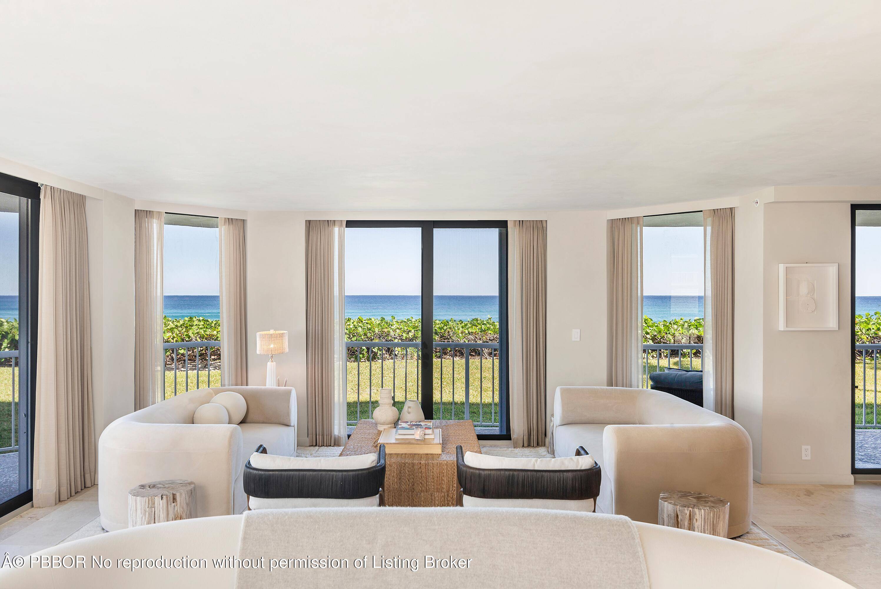 Located directly on the ocean in the prestigious Enclave building on South Ocean Boulevard in Palm Beach, this beautifully designed residence was created by renowned interior designer Noa Santos.