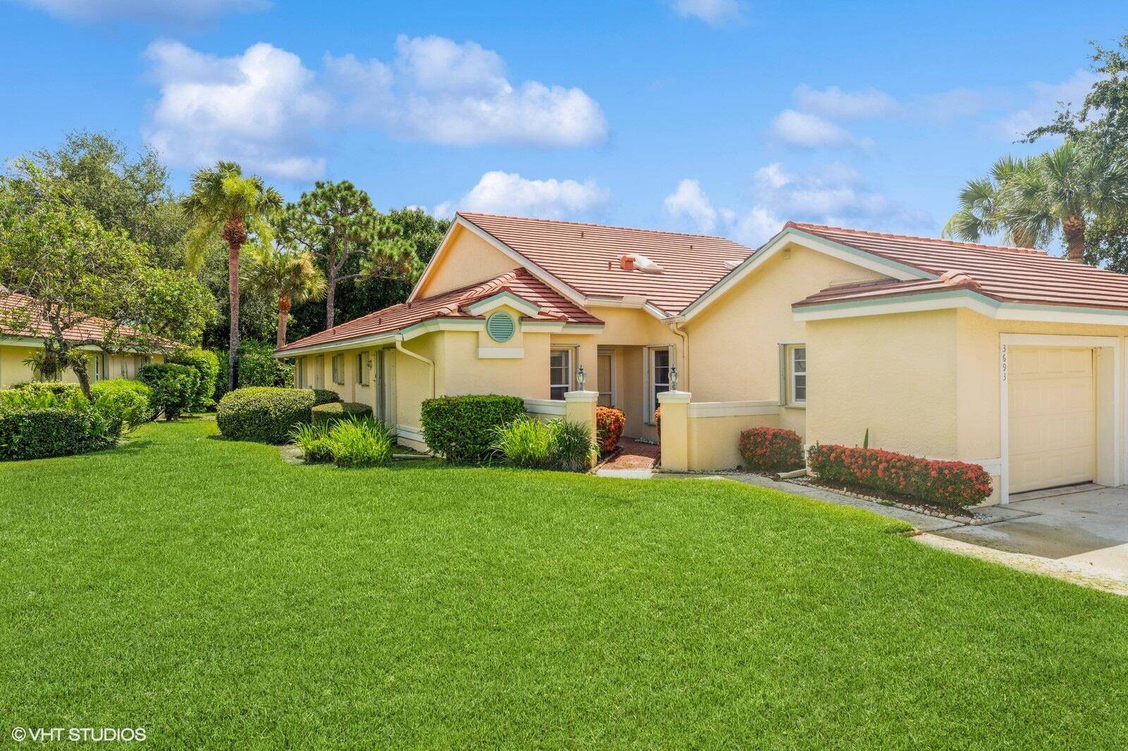 Enjoy easy living in the highly sought after gated 55 community of Whispering Sound.