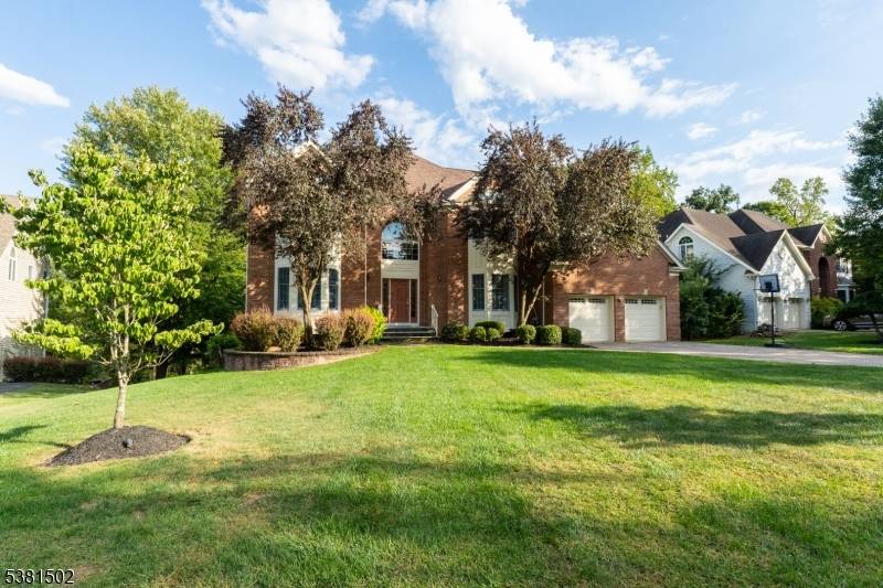 Beautifully appointed Northwest facing Renoir Model situated on a level lot in the highly sought after Beacon Crest community.