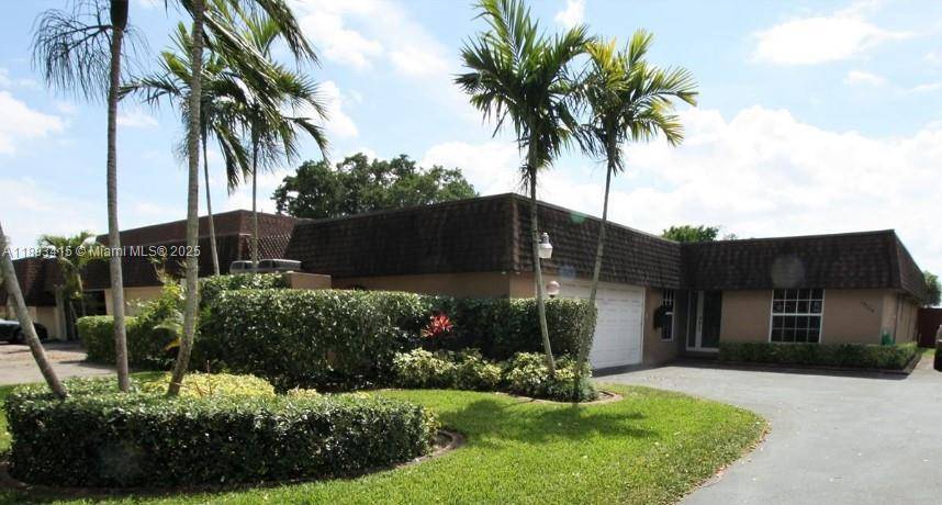 Enjoy golf course living at its finest in this spacious 3 bedroom, 3 bathroom home nestled within the highly desirable Country Club of Miami community.