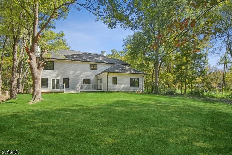 A statement of modern luxury and timeless elegance awaits in this new construction Parsippany estate.