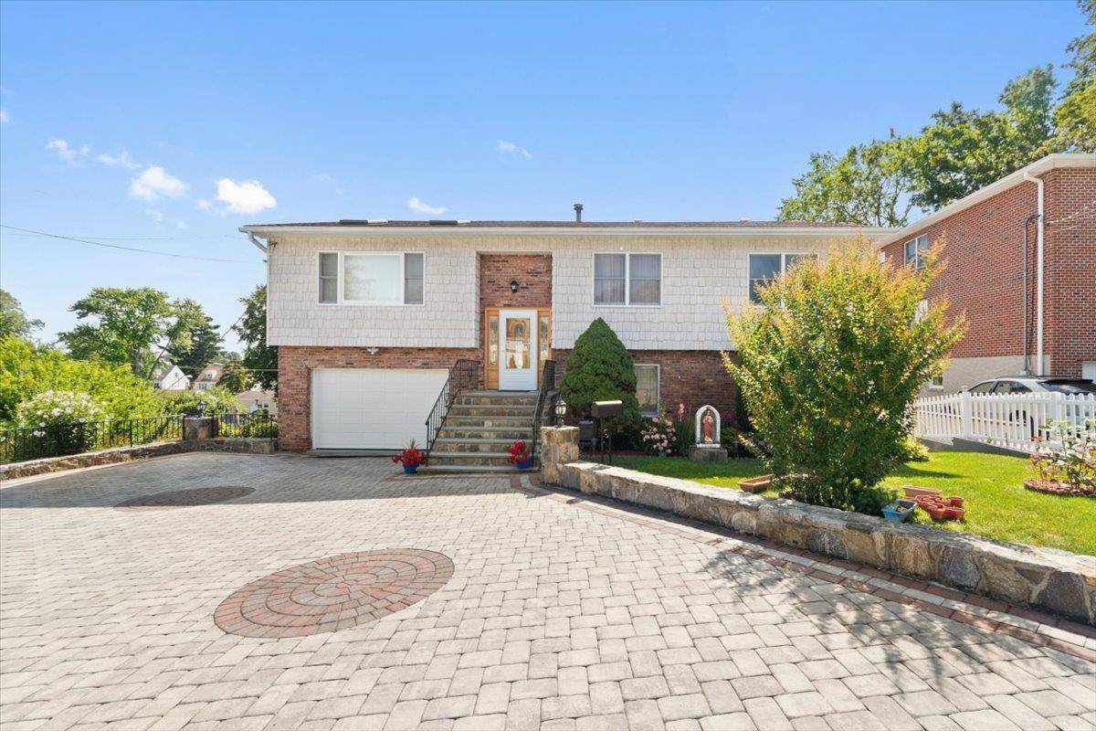A Unique 4 Bedroom Raised Ranch located in the desirable Westchester Hills neighborhood of Yonkers, this spacious and flexible home offers a rare layout perfect for extended or multigenerational living.