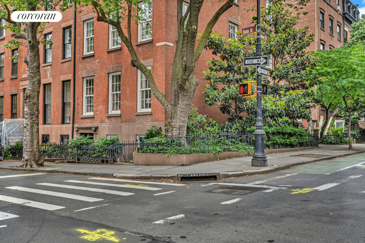 At the corner of tree lined State amp ; Henry Streets is a unique Brooklyn Heights 2 bedroom garden home with outdoor space and a wood burning fireplace.