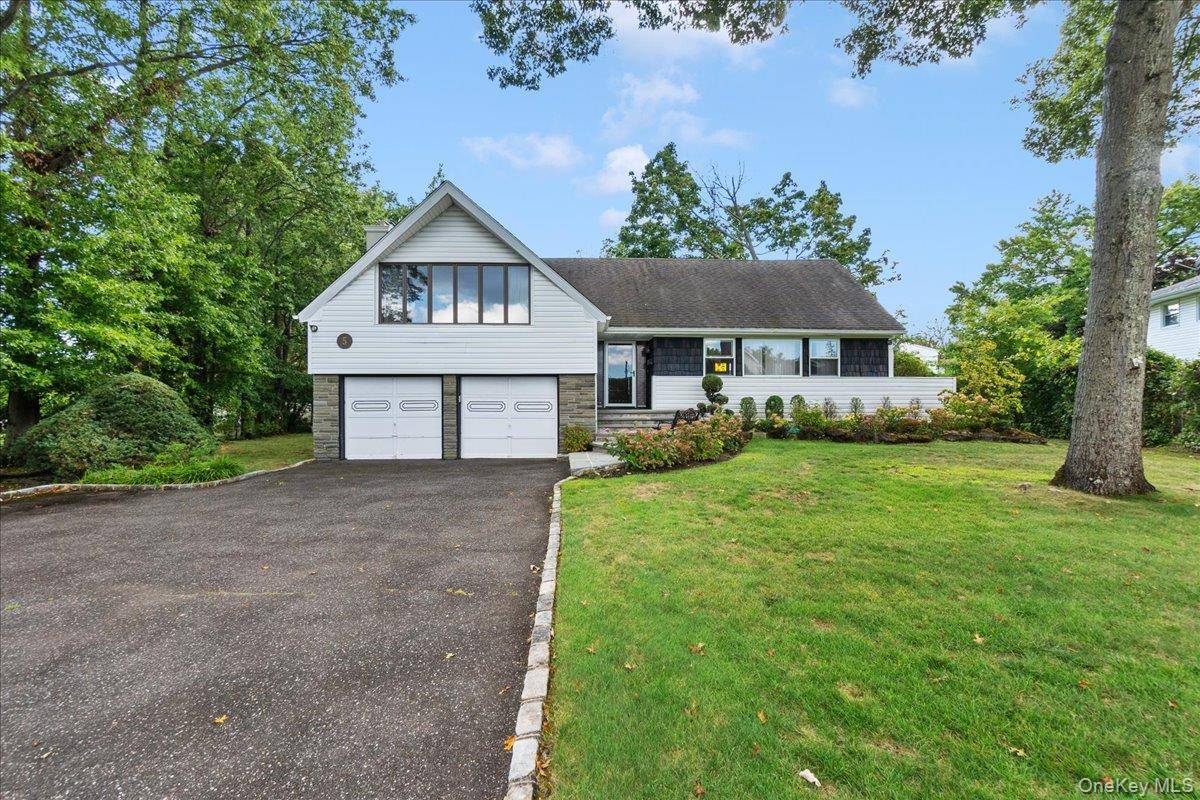 This spacious chalet expanded ranch offers timeless curb appeal, set on a beautiful, expanded landscaped property.