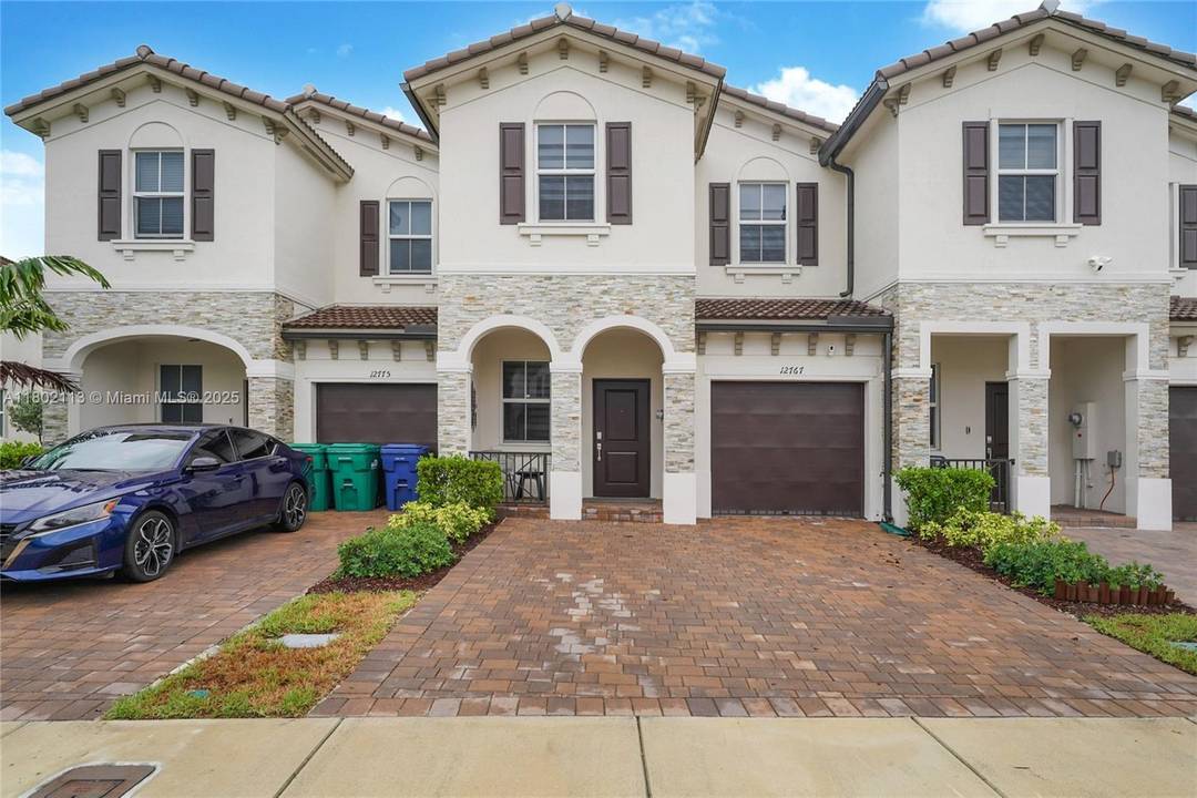 LOWEST PRICED lakefront townhome Westview, Miami, built in 2023, this modern, comfortable, and spacious 3 bed, 2.