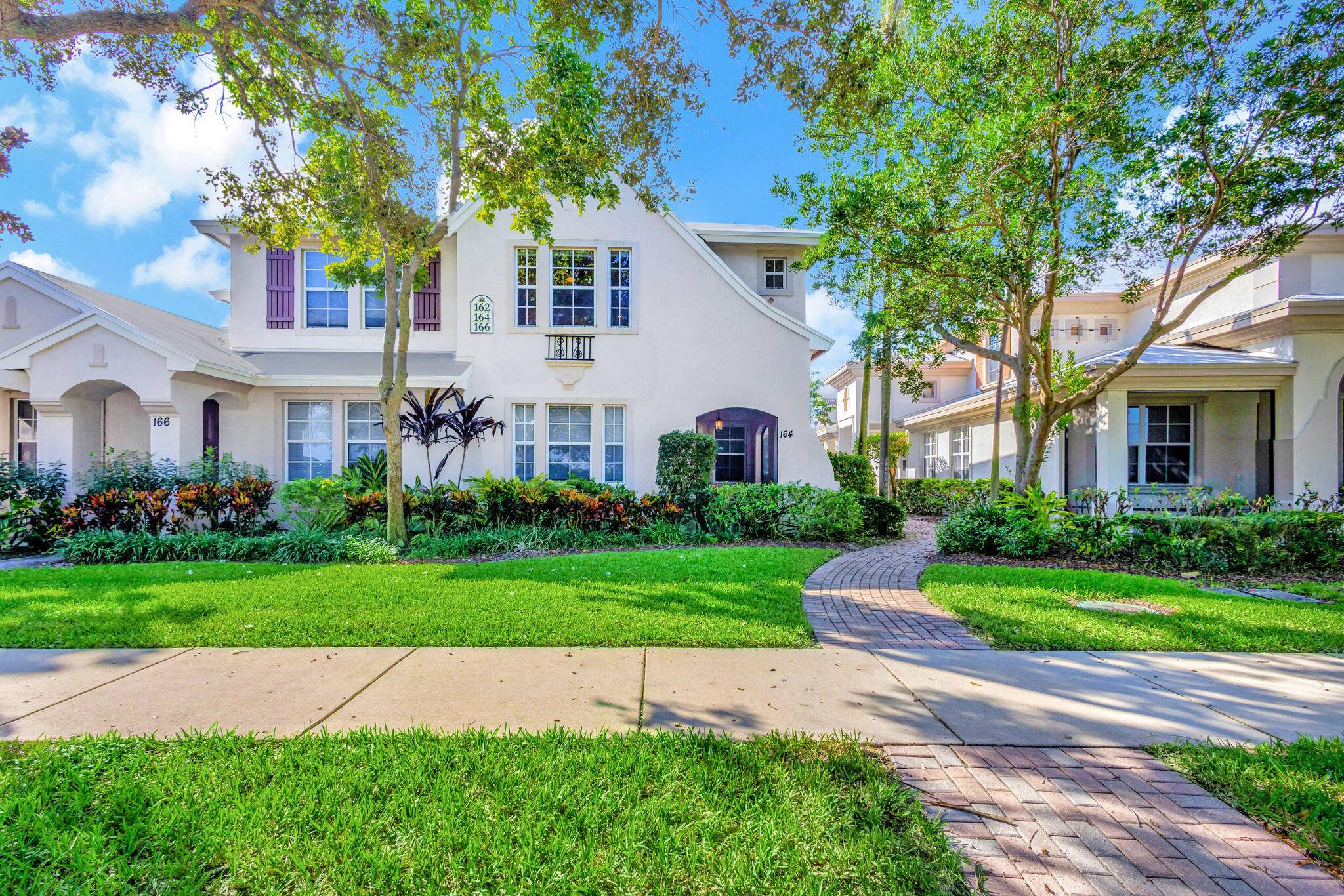 Nestled in the exclusive, gated community of Evergrene, this beautifully remodeled, turnkey townhome with a new roof offers 3 bedrooms and 2.