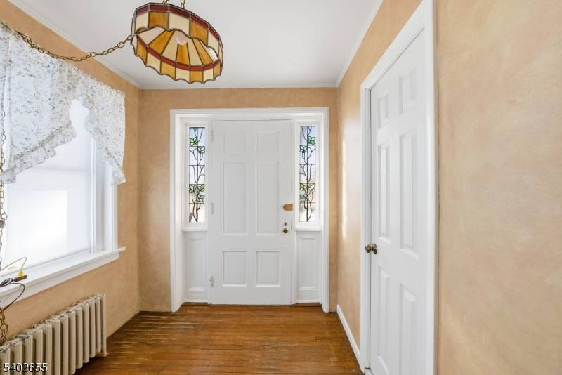 Set on desirable Parish Drive directly across from Preakness Golf Course, this classic Colonial offers timeless charm, generous space, and endless potential.