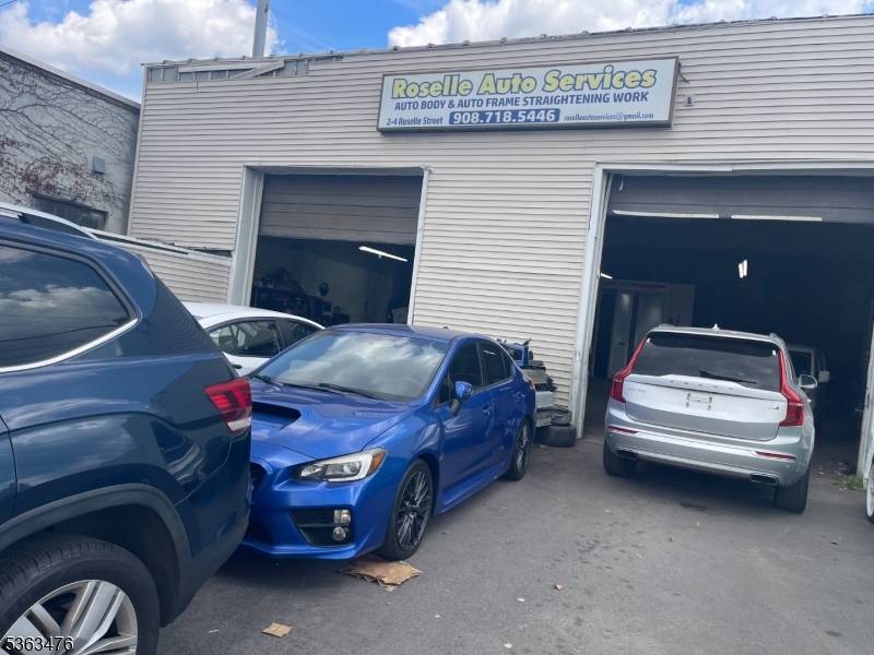 FOR SALE FREE STANDING INVESTMENT PROPERTY OR OWNER USER IN NEAR FUTURE ; PRESENTLY LEASED TO AUTOBODY REPAIR SERVICES, DRIVE IN DOORS, SUSPENDED GAS HEATERS IN SHOP SPACE.