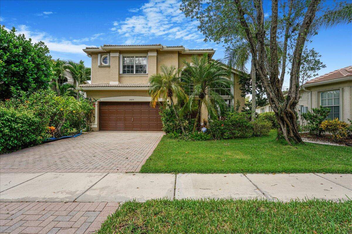 Elegantly Appointed Residence on an Oversized Private Lot with Serene Preserve and Lake Views This exceptional home offers a rare combination of luxury, privacy, and natural beauty.