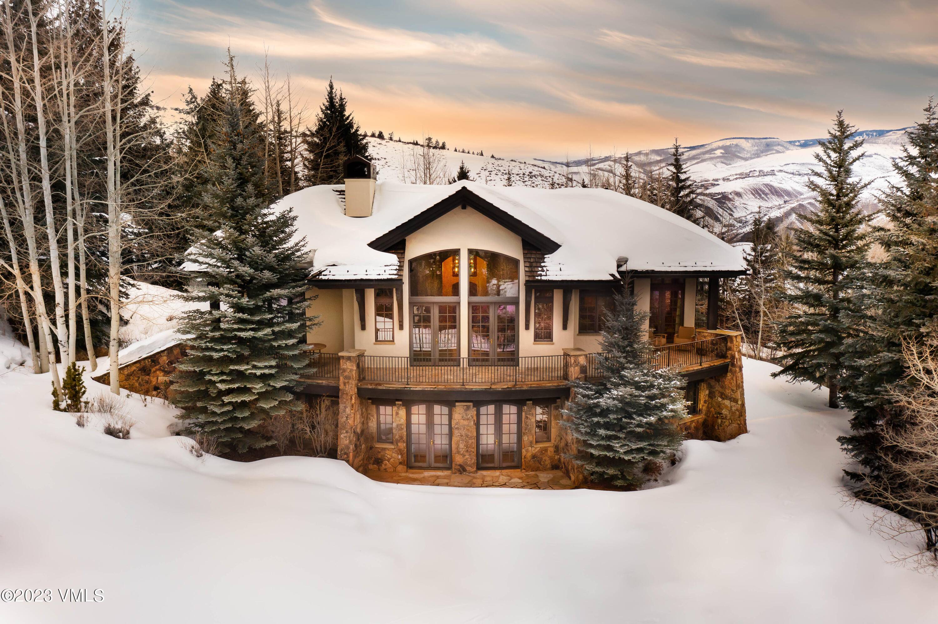 This stunning property boasts breathtaking views of the surrounding mountains and is situated in a prime location with easy access to world class skiing, hiking, and outdoor adventures.