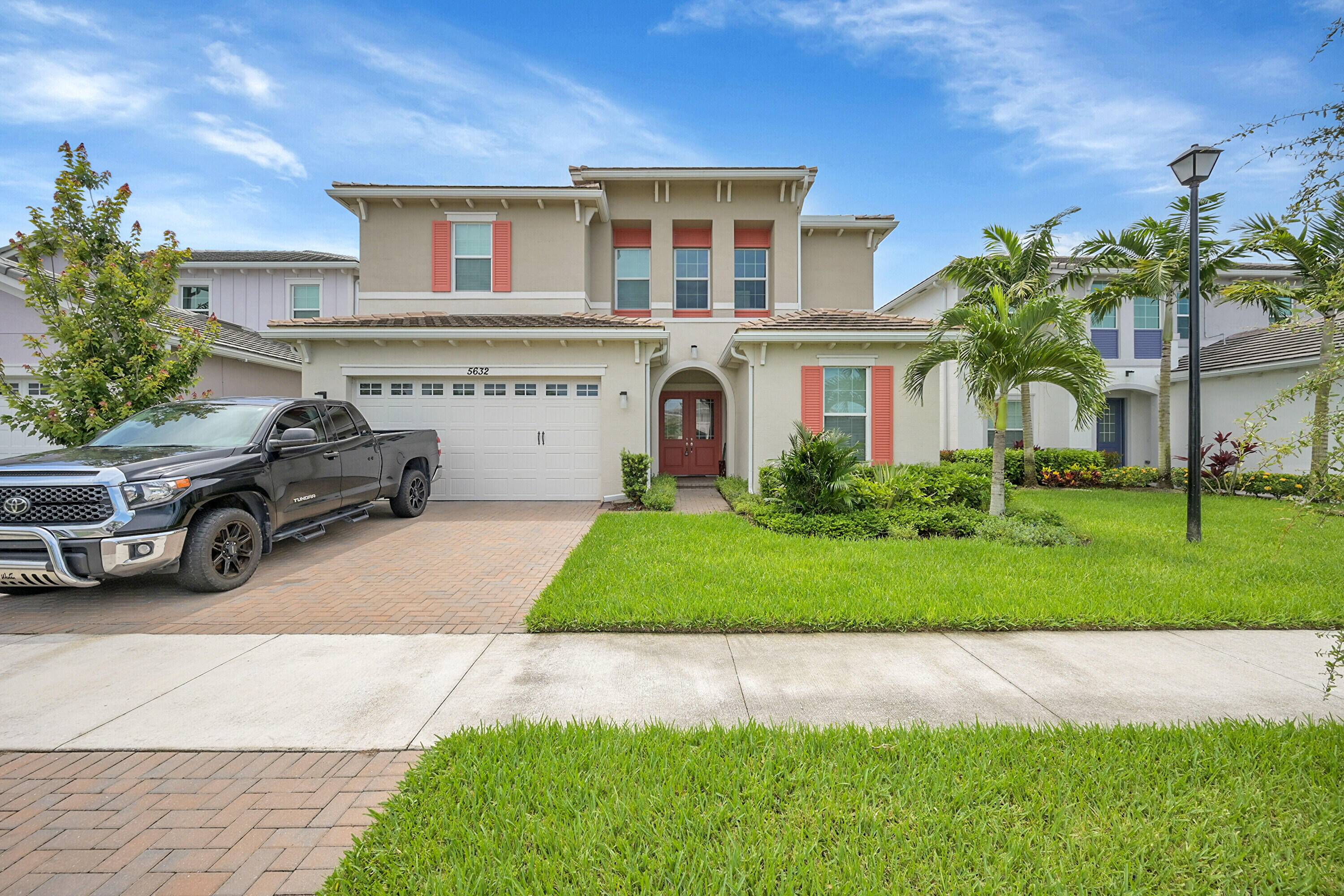 Elegant 6 bed den home in sought after Orchards of Westlake.