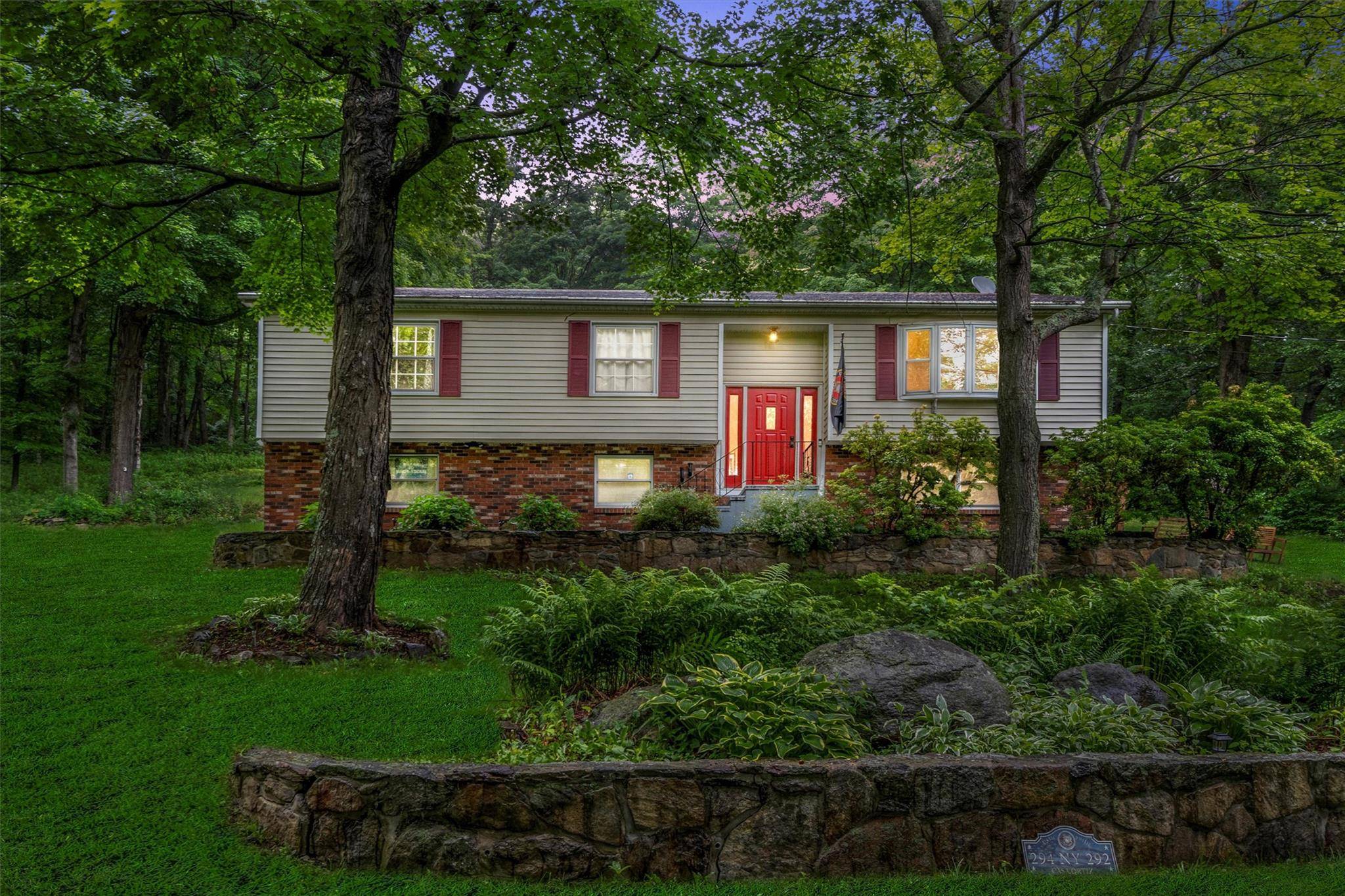 Nestled on a serene 1. 35 acre lot, this charming raised ranch offers the perfect blend of privacy and convenience, with easy access to shopping, highways, the train station, and ...
