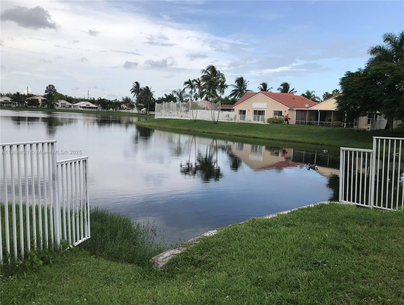 LAKEFRONT GEM ! ! OPEN amp ; BRIGHT overlooking Lake Volume ceilings boast recessed lighting.