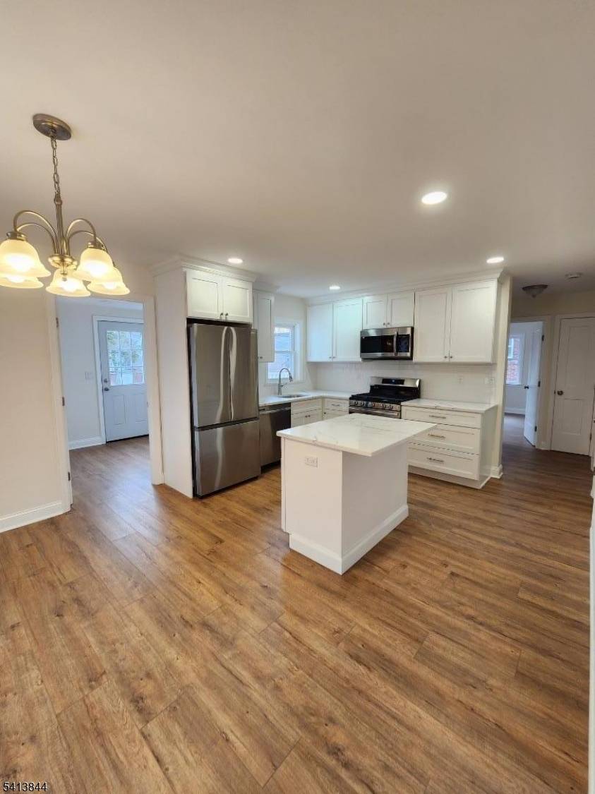 Picture Perfect.... Move right in to this fully renovated 4 bedroom 2 bath home.