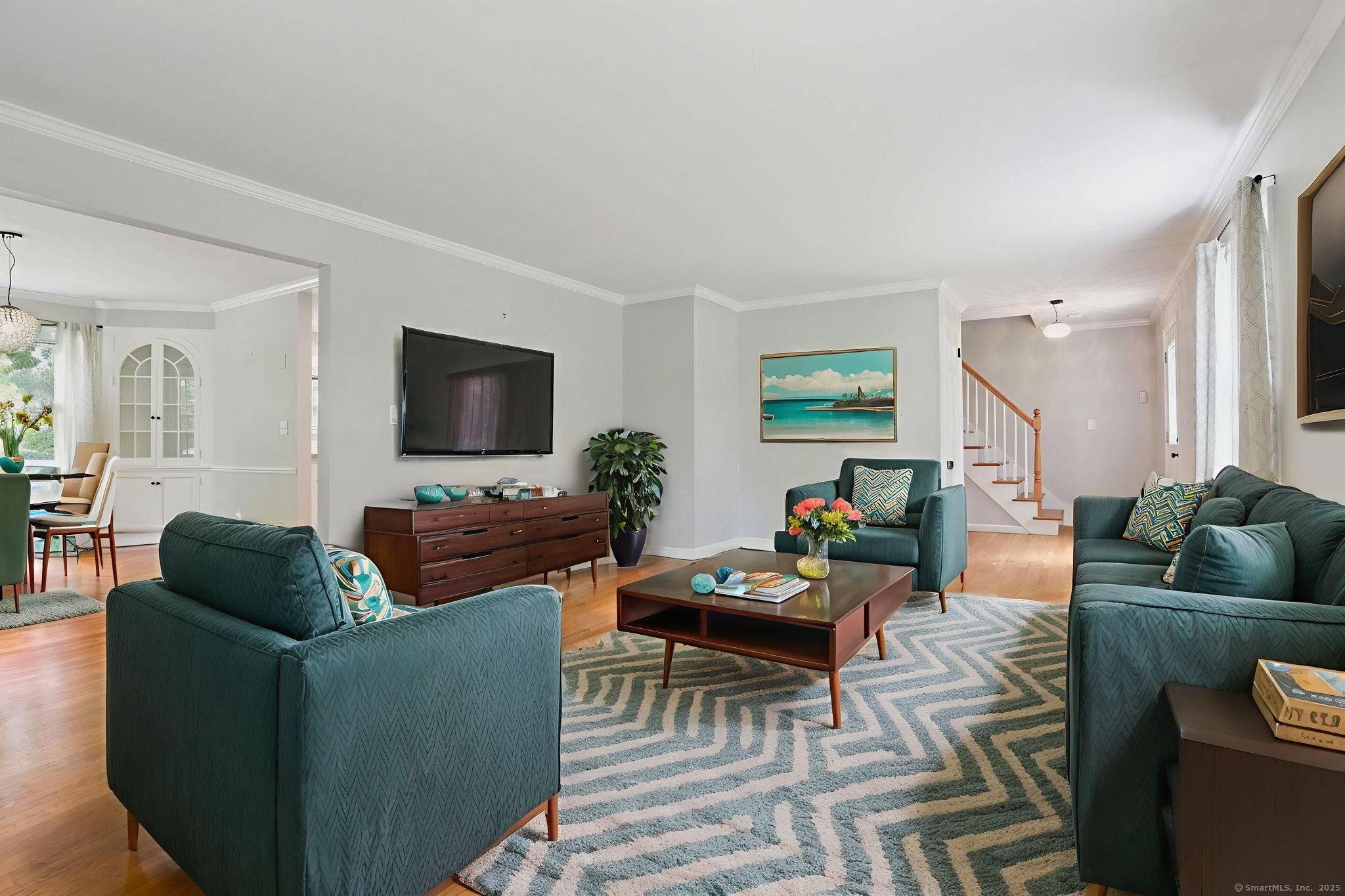Charming 4 bedroom Colonial, set back off of the road awaits a beautifully appointed Gambrel style colonial.