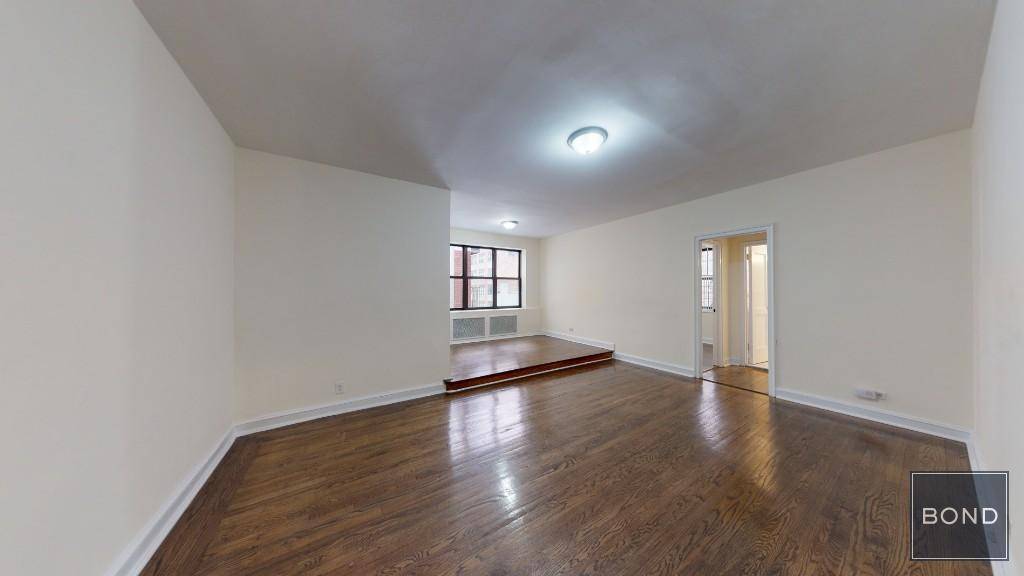 Here's a beautiful prewar one bedroom with delightful prewar details including an entry foyer, elevated dining platform, archways, molding and vintage checkerboard bathroom.