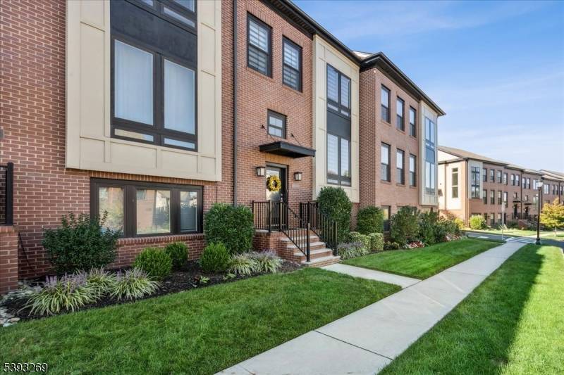 3 bedroom, 3. 5 bath Montgomery Crossing townhome built in 2020, with a RARE FULLY FINISHED LOWER LEVEL including a FULL BATH and FLEX ROOM WITH CLOSET AND STREET LEVEL ...