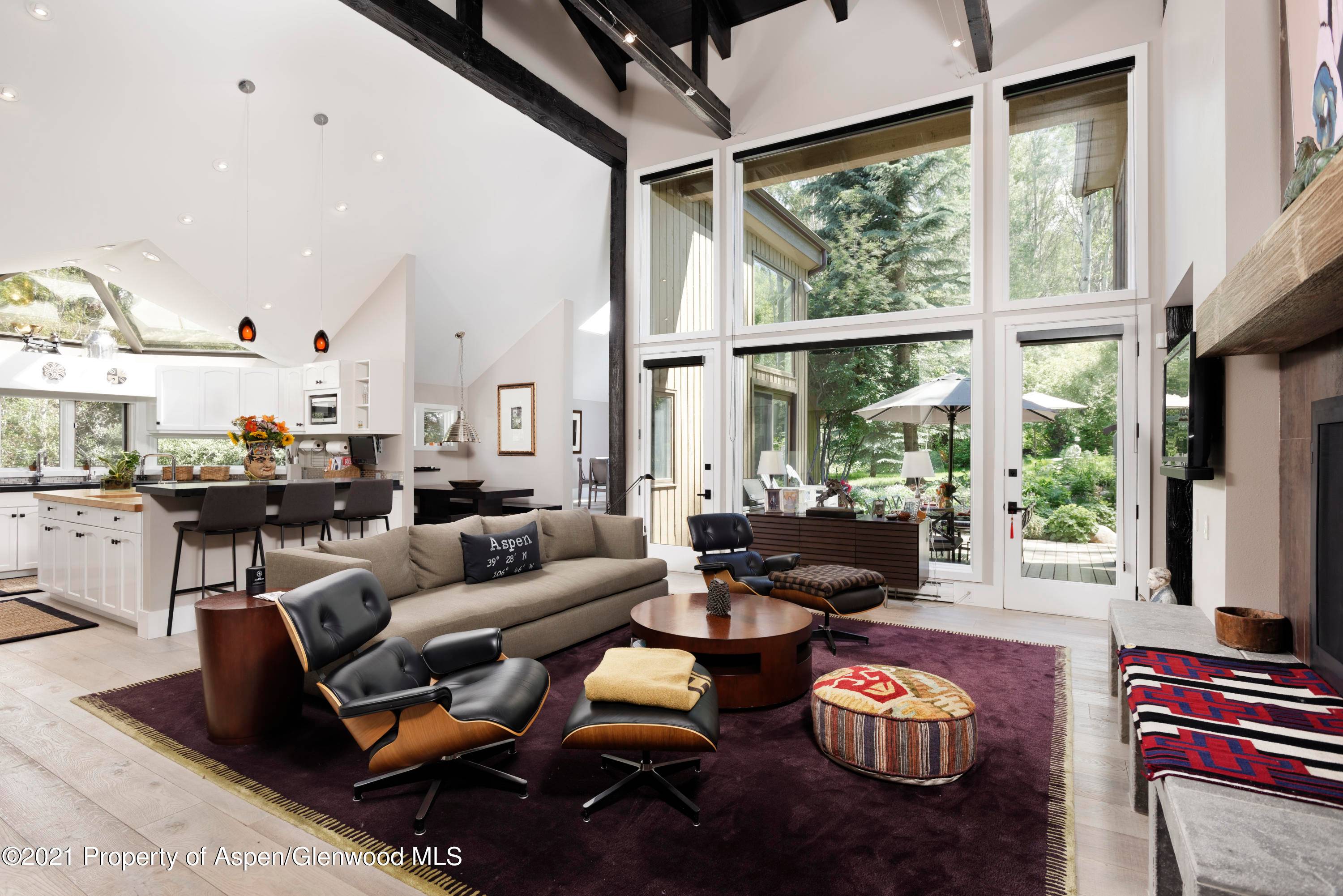 Located on Black Birch Drive, this charming Aspen home enjoys end of road privacy on an oversized lot.