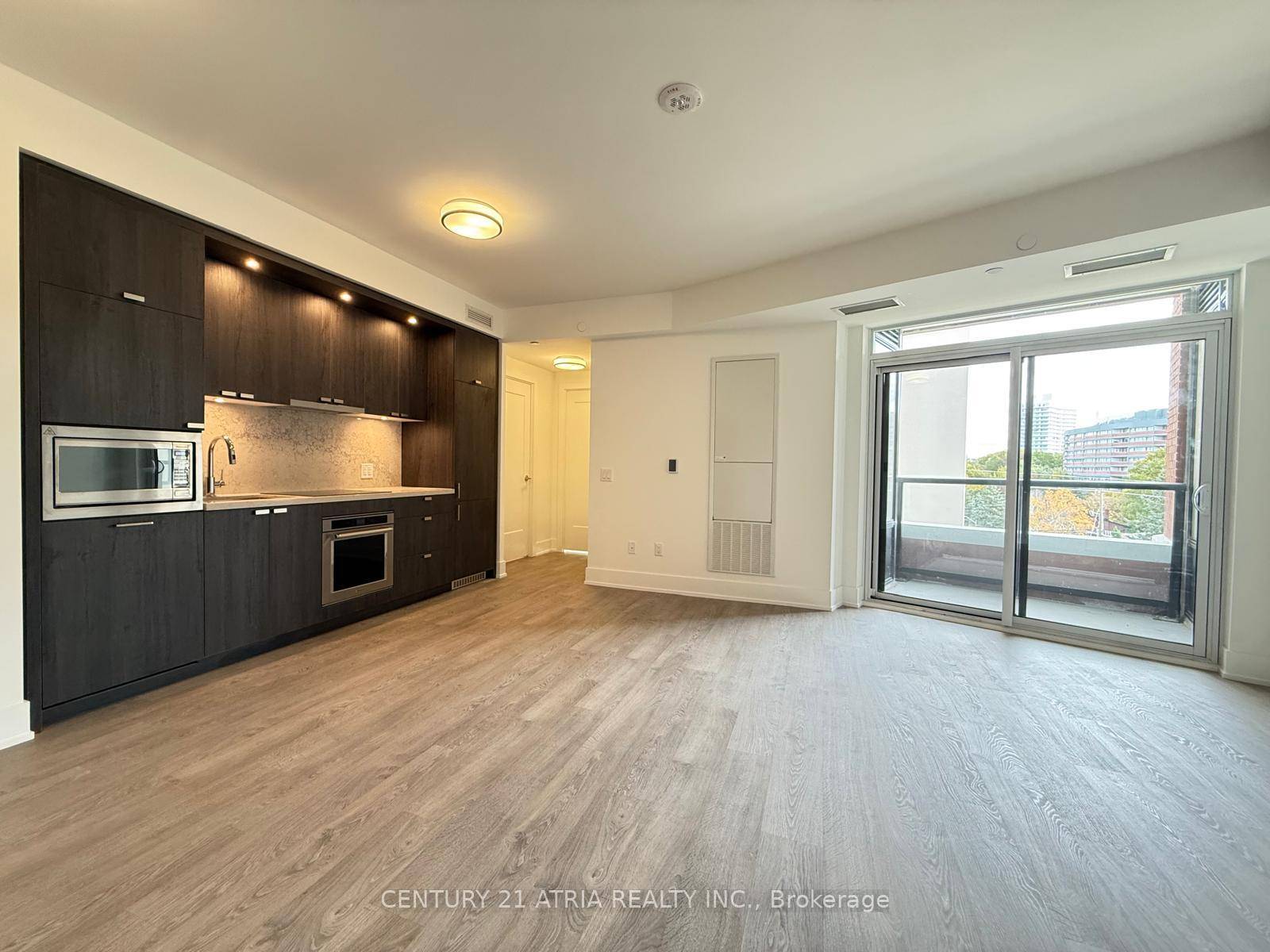 PARKING amp ; LOCKER Included Window coverings and the island to be installed.