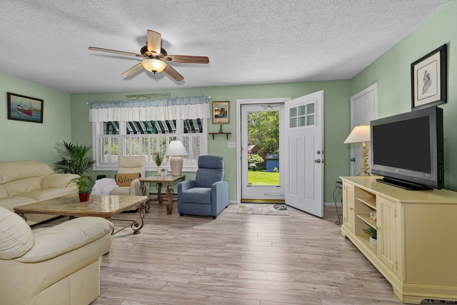 Welcome home to this charming 1, 412 sq ft ranch just a stone's throw from sparkling Lake Bunggee !