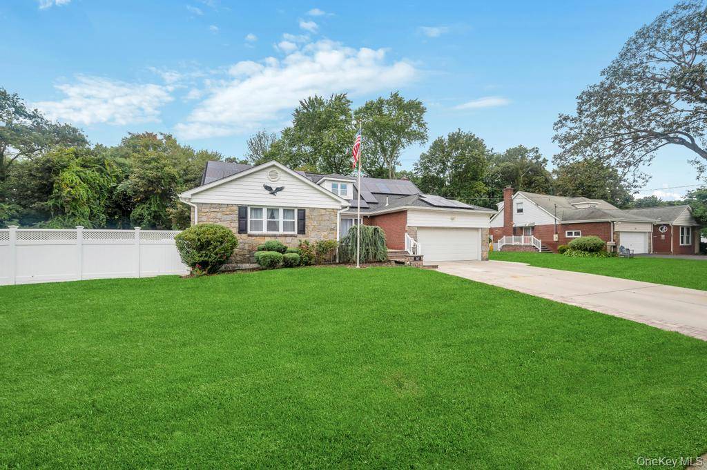 This spacious expanded Cape Cod home offers the perfect blend of comfort and modern updates, with 5 bedrooms and 4.