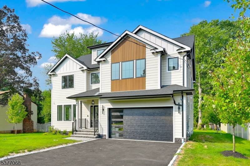 Exquisite 7 bedroom, 5. 5 bathroom NEW CONSTRUCTION Custom Colonial boasting approx.