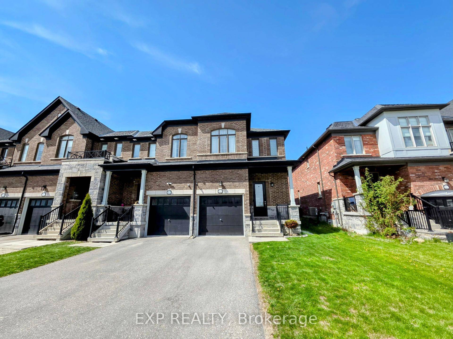 Experience Luxury In This Corner Unit Townhouse, Situated Beside A Serene Pond.