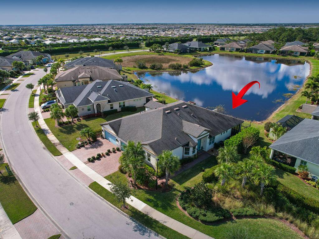 Lakefront living in this spacious 2 2 2 Villa plus large flex room !