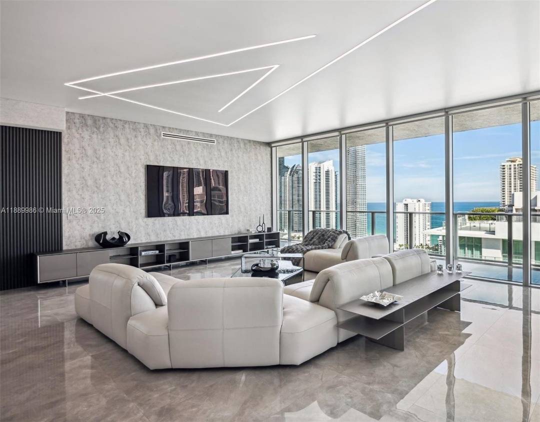 This stunning, state of the art Upper Penthouse is the epitome of turnkey luxury, w 4BR Den amp ; 5BA, spanning nearly 5, 000sf of living space 3, 877sf interior ...