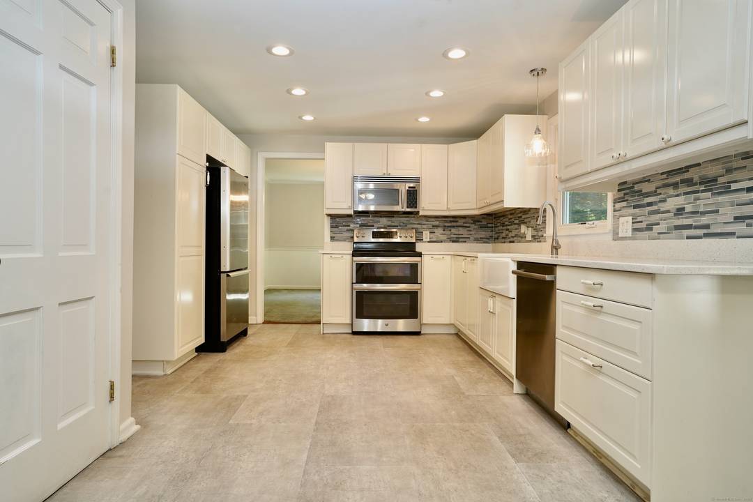 Freshly Painted, Brand New Carpets and updated lighting Move In Ready !