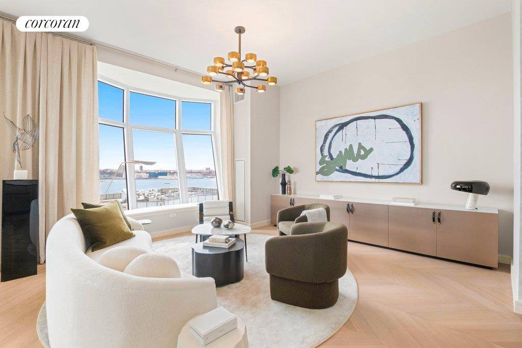 DIRECT HUDSON RIVER VIEWS FROM THIS GENEROUS THREE BEDROOM WITH DEN WITH LUXURIOUS PRIMARY BEDROOM SUITE.