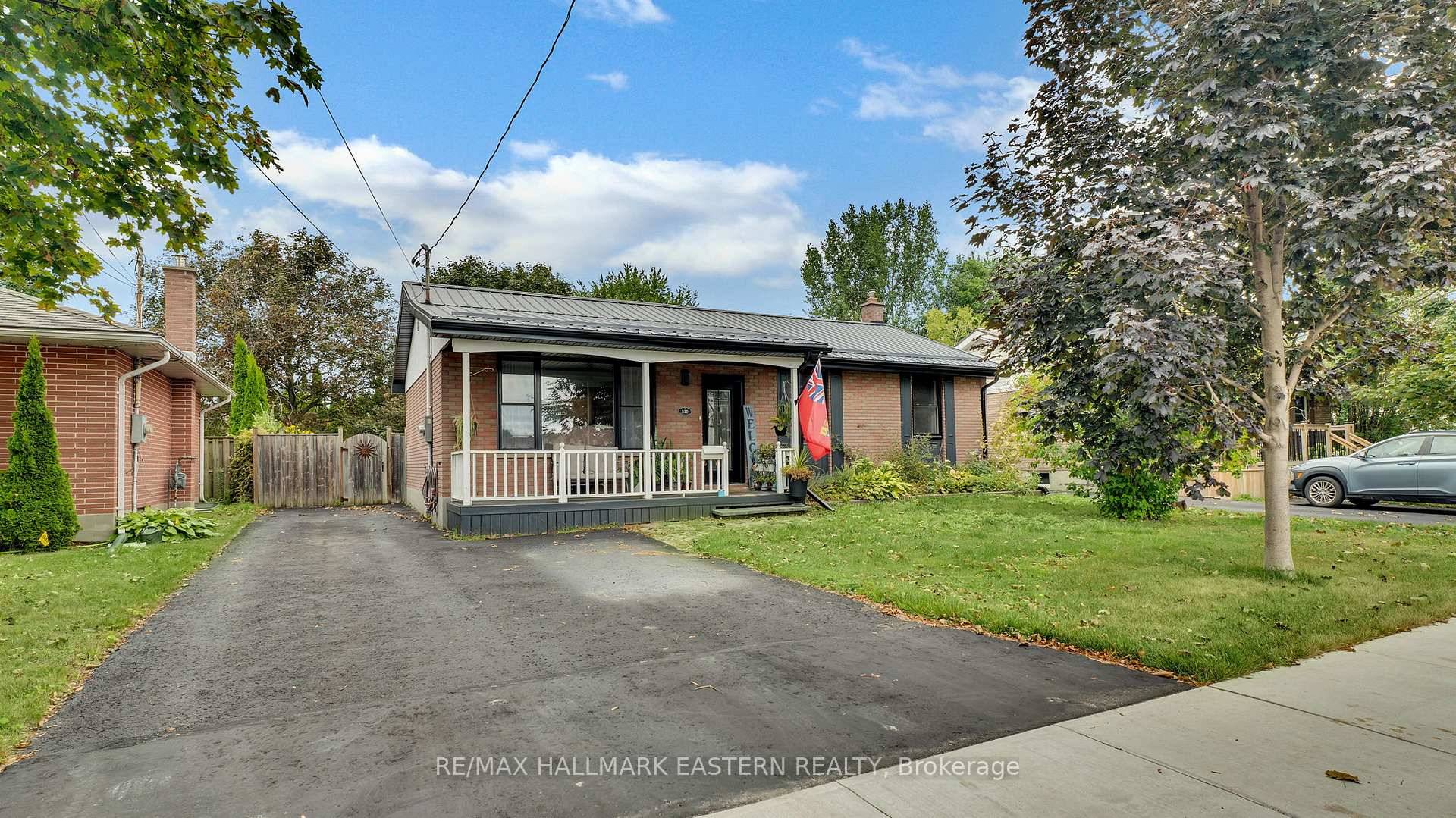 Perfect brick bungalow with a spacious backyard that offers all the peaceful vibes of country living right in town !