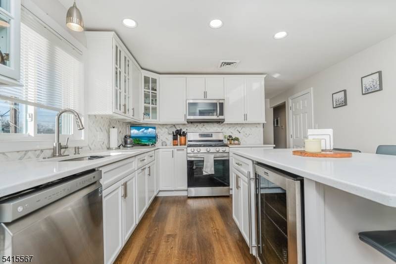Completely renovated and exceptionally maintained, this move in ready home offers modern upgrades, versatile living space, and outstanding outdoor amenities.