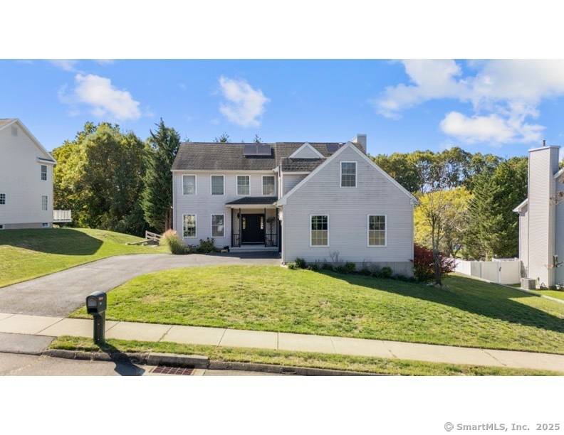Welcome to this charming, sunny single family colonial home, perfectly designed for modern living in a cul de sac !