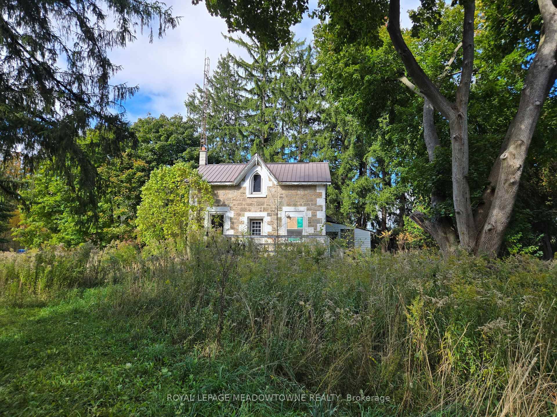 This rare scenic 83 acre property located just south of Highway 401 and the Village of Moffat, and north of Campbellville on a paved road.