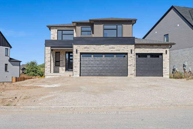Stunning New Executive Home in Eagles Ridge, West Five, located on a generous lot backing onto a protected dry pond.