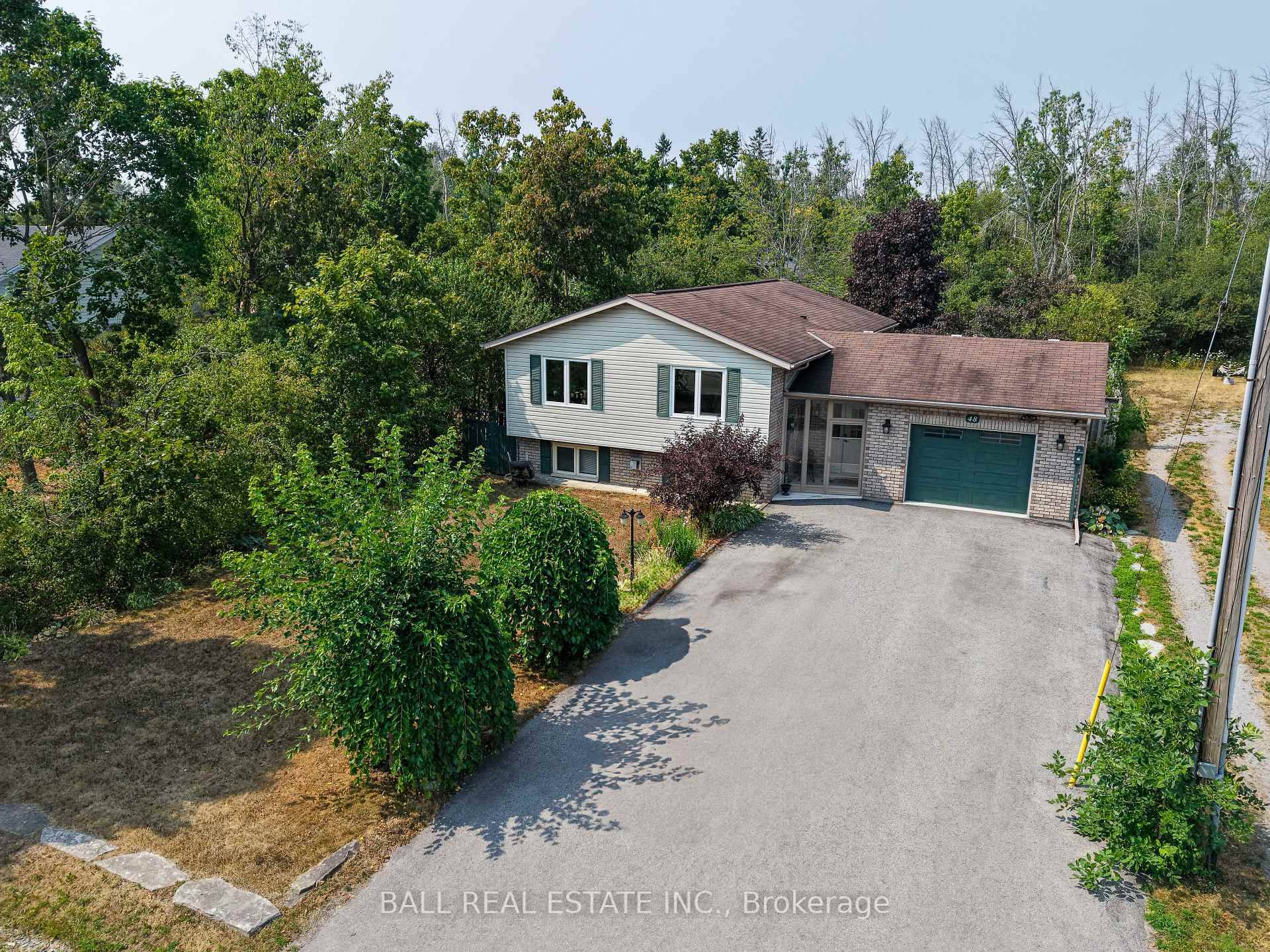 Rare opportunity to live in town and back onto Crown Land !