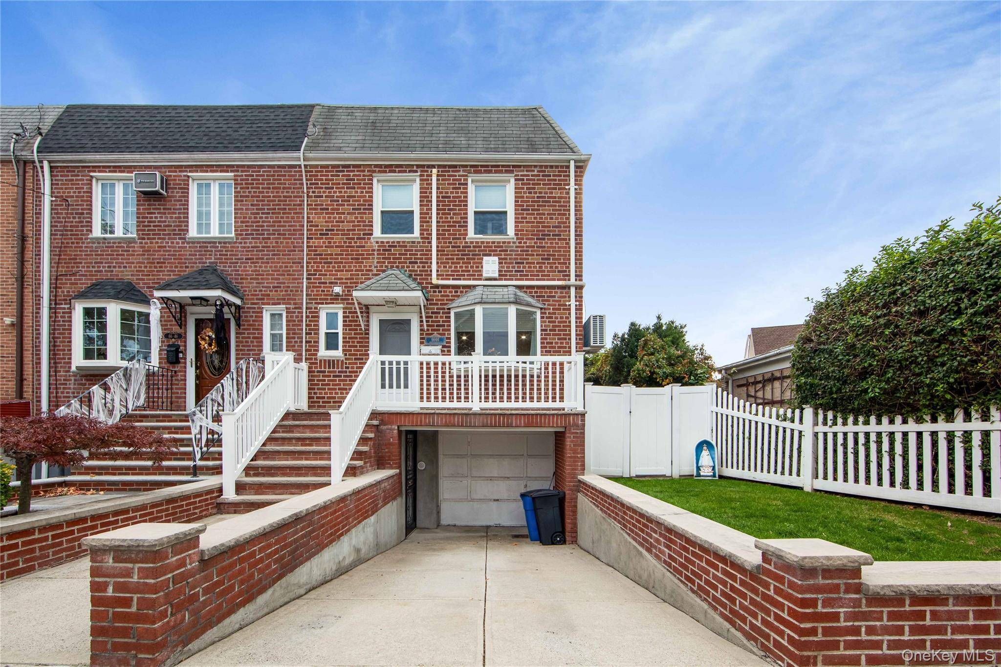 This totally and tastefully renovated one family semi detached brick home offers a main level with an open living and dining room, a modern kitchen, a half bath and access ...