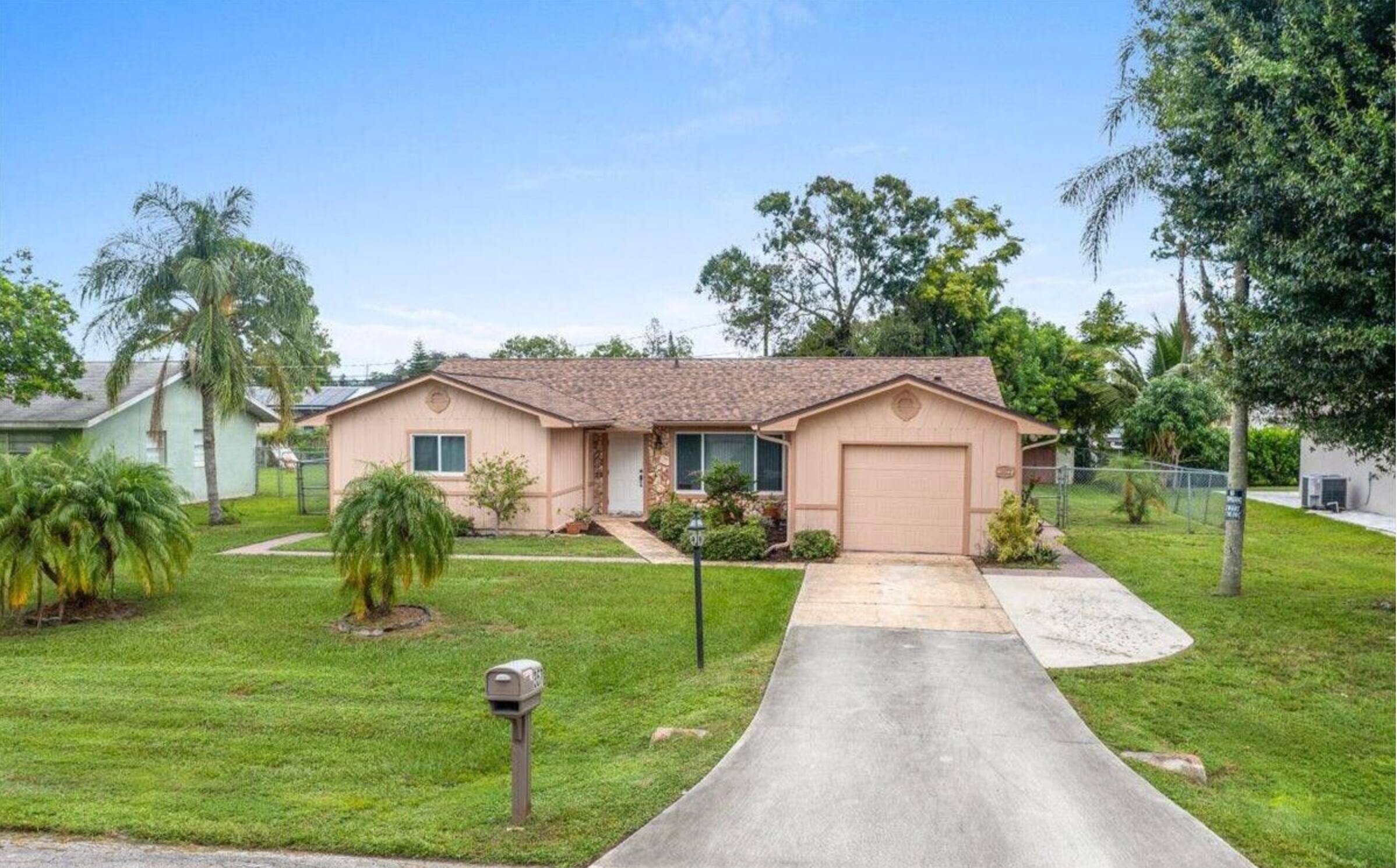 Welcome home to this beautifully cared for 3 bedroom, 2 bath residence in a peaceful Port St.