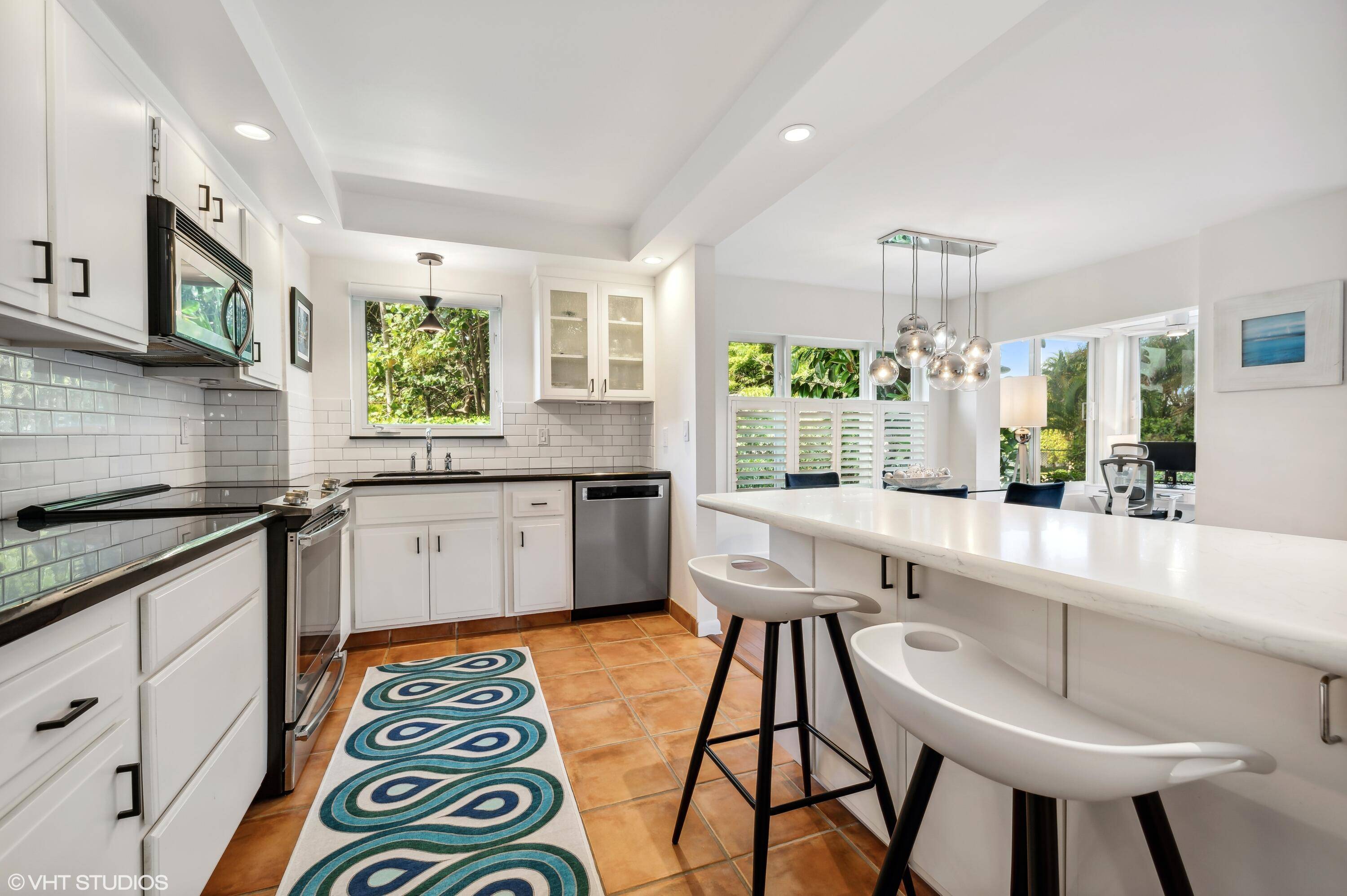 Stunning, 1 1. 5 with open floor plan and views of the Intracoastal Waterway.